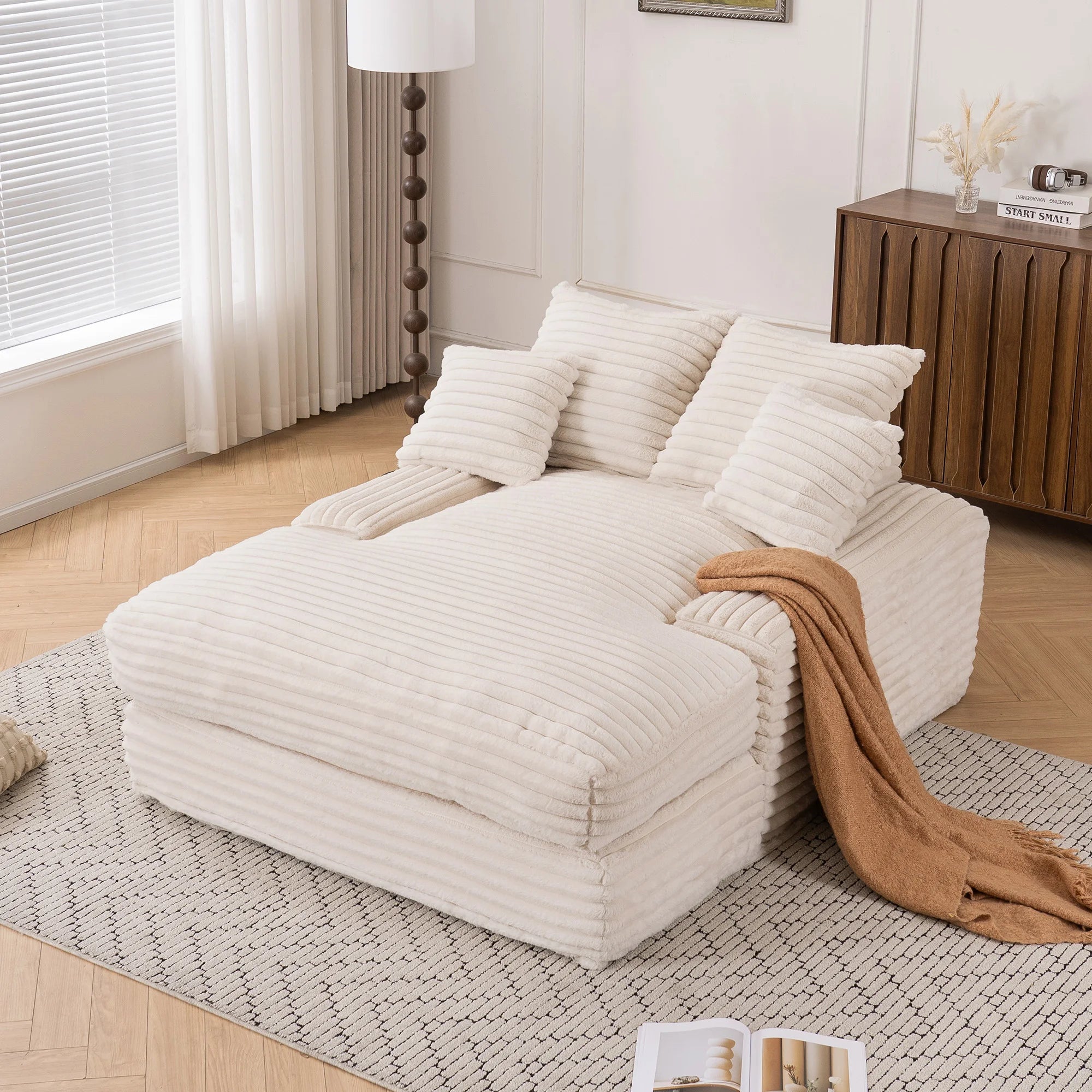 Poltrona chaise longue oversize imbottita in velluto a coste